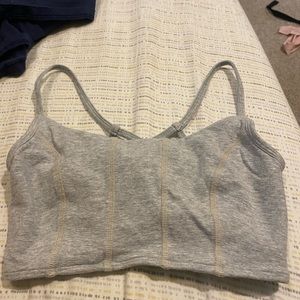grey crop top that crosses in the back